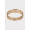 Love ring in yellow gold