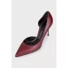 Red leather high heel shoes
