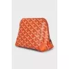 Orange cosmetic bag made from signature canvas