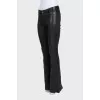 Black leather flared trousers