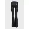 Black leather flared trousers