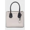 Gray leather bag with white inserts