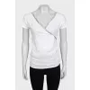 White embellished t-shirt with a cutout