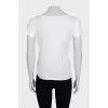 White embellished t-shirt with a cutout