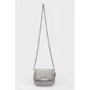 Gray handbag with varnished inserts