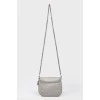 Gray handbag with varnished inserts