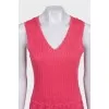 Fitted pink dress with perforations