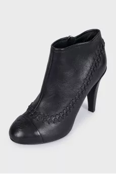 Leather ankle boots with heels and decoration