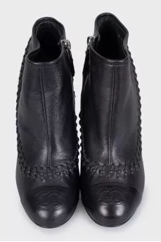 Leather ankle boots with heels and decoration