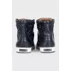 High-top leather sneakers decorated with crystals