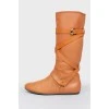 Brown leather boots with metal buckle