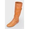 Brown leather boots with metal buckle