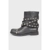 Boots with metal spikes