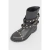 Boots with metal spikes