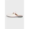 White leather mules with low heels