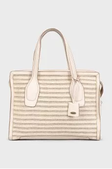 Bag made of textile and leather with perforation