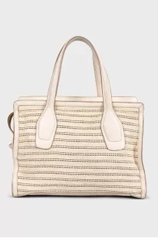 Bag made of textile and leather with perforation