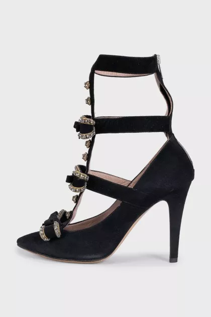 Suede shoes decorated with crystals and a zipper