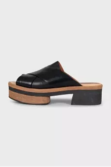 Black leather clogs