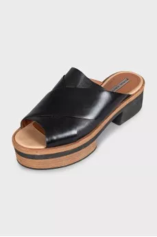 Black leather clogs
