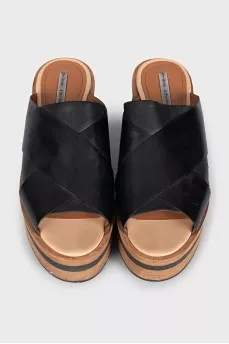 Black leather clogs