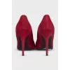 Red suede high heels