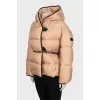Beige down jacket with leather trim