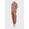 Silk suit with stripes in a signature print