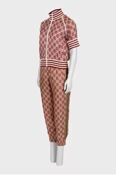 Silk suit with stripes in a signature print