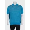 Men's blue polo shirt with a pattern