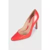 Orange leather stiletto heels
