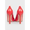 Orange leather stiletto heels