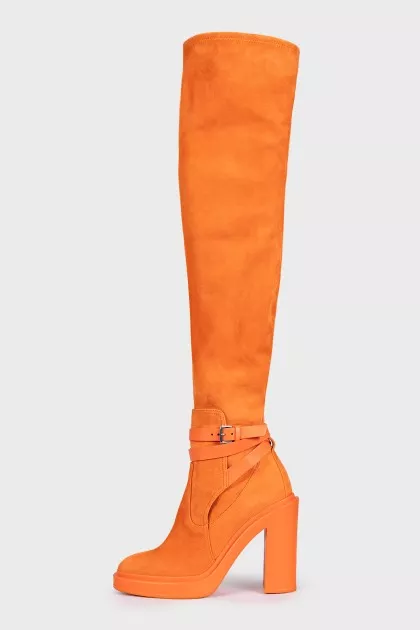 Orange suede over-the-knee boots with heels