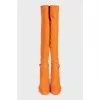 Orange suede over-the-knee boots with heels