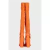 Orange suede over-the-knee boots with heels
