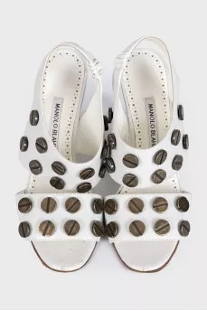 White leather sandals with decor