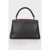 Capucines MM woven bag