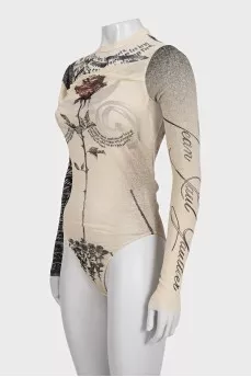 Beige printed bodysuit with an open back
