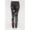 Black jeans with multi -colored drawings and inscriptions