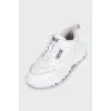 White Speedtrack sneakers