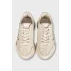 Beige leather sneakers with logo