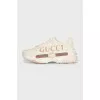 Beige leather sneakers with logo