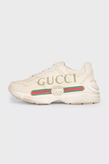 Beige leather sneakers with logo