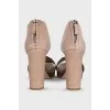 Leather heeled sandals with a zipper