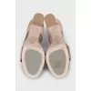 Leather heeled sandals with a zipper