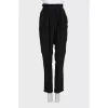 Tapered black trousers with elastic waistband
