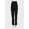 Tapered black trousers with elastic waistband