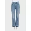 Light blue jeans with a distressed effect