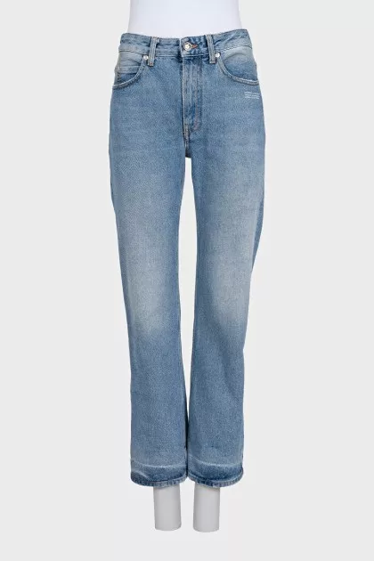 Light blue jeans with a distressed effect