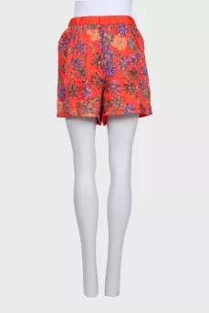 Помаранчеві шорти декоровані паєтками